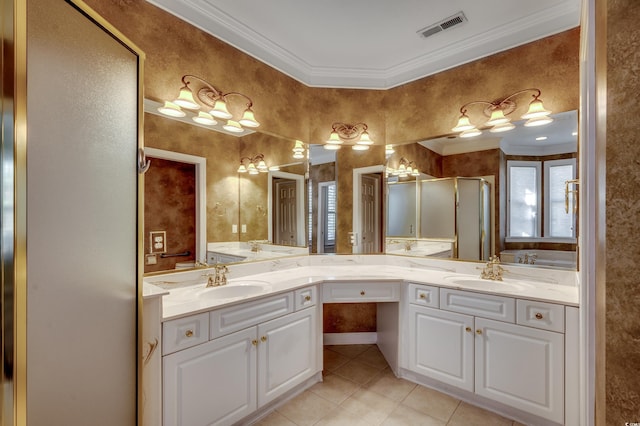 full bath featuring ornamental molding, visible vents, and a sink