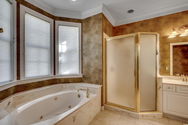 bathroom with ornamental molding, a stall shower, vanity, a jetted tub, and tile patterned floors