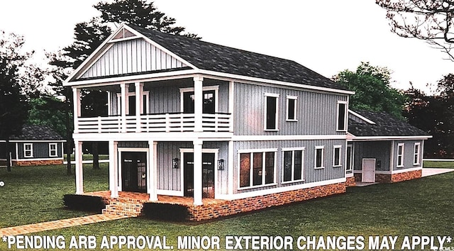 237 Madison Dr, Georgetown, SC 29440 - back of property featuring a yard, a balcony, and board and batten siding