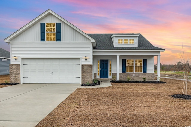 view of front facade with a garage, concrete driveway, a porch, and roof with shingles