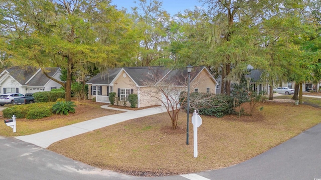 view of front of house with concrete driveway