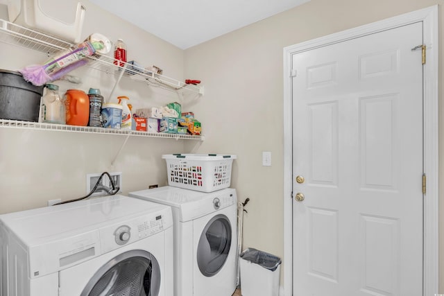 laundry room with laundry area and washer and dryer