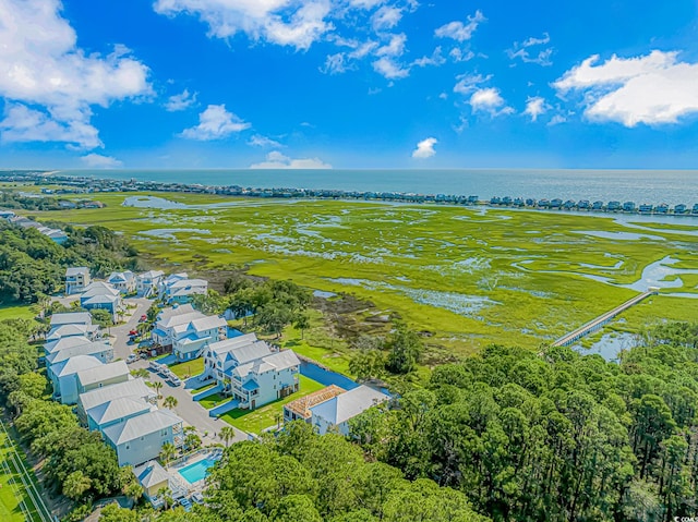 drone / aerial view with a residential view and a water view