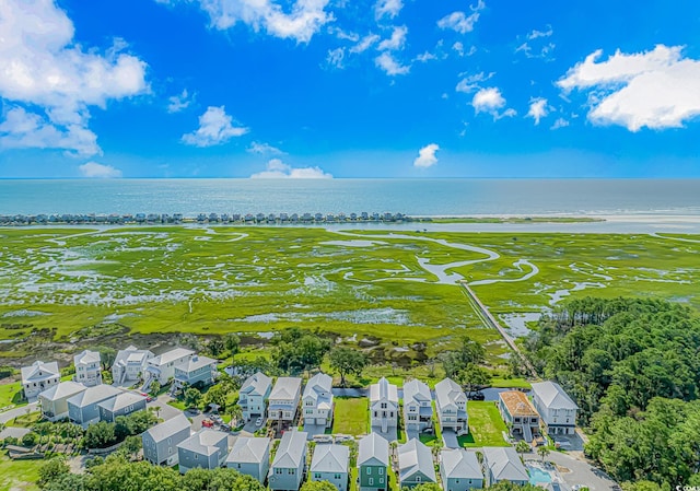 aerial view featuring a water view and a residential view