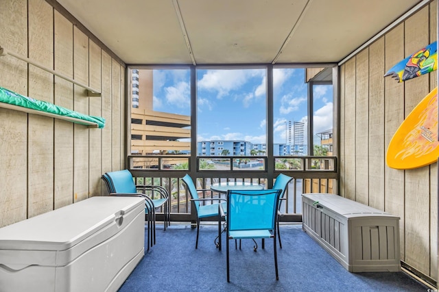 sunroom with a city view