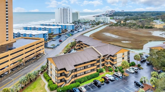 aerial view featuring a water view and a city view