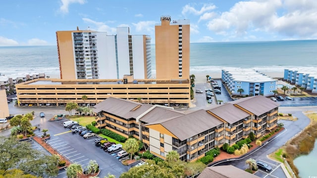 aerial view featuring a water view and a city view