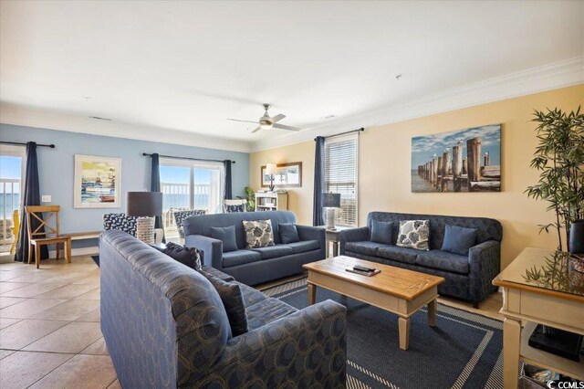 817 S Ocean Blvd Unit 105, North Myrtle Beach, SC 29582 - living room with ornamental molding, ceiling fan, and light tile patterned floors