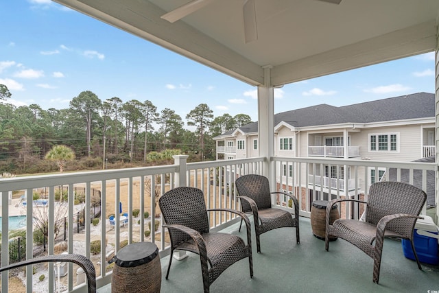 balcony featuring a ceiling fan