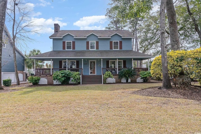 country-style home featuring roof with shingles, a porch, a front lawn, and a chimney