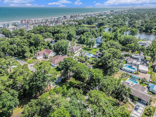 317 14th Ave N, Surfside Beach, SC 29575 - aerial overview of property's location with a large body of water and a tree filled landscape