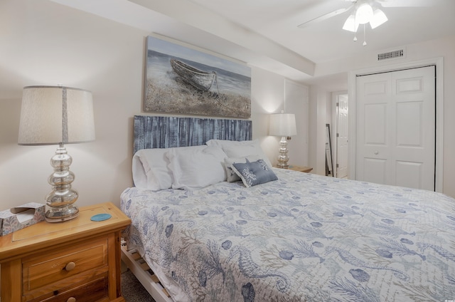 bedroom featuring a closet, visible vents, and ceiling fan