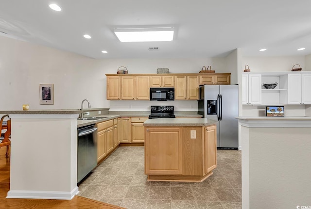 kitchen with open shelves, visible vents, a kitchen island, a sink, and black appliances