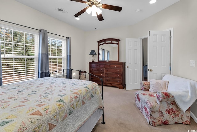 bedroom with recessed lighting, light carpet, ceiling fan, and visible vents