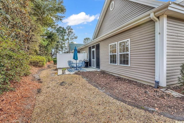 view of yard with a patio area and fence