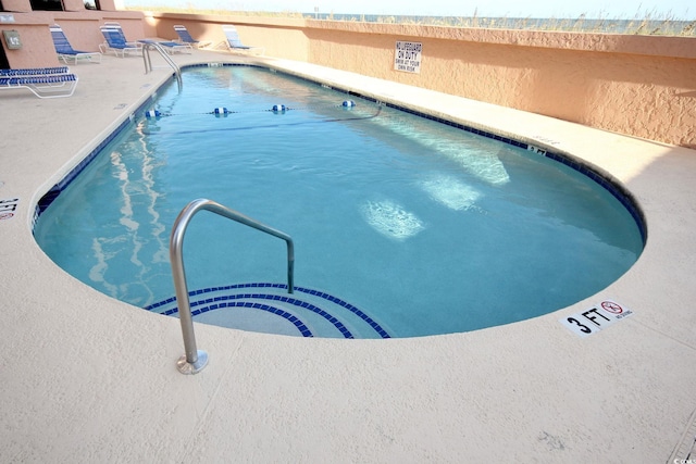 community pool featuring a patio