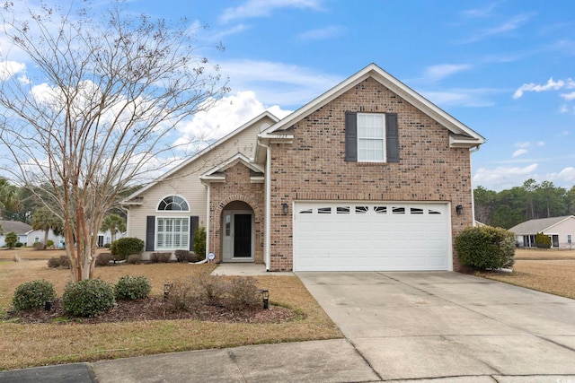 traditional-style house with a garage, concrete driveway, and brick siding