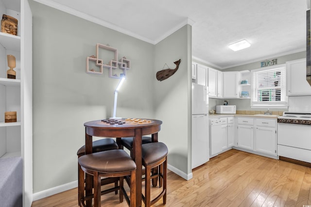 kitchen featuring open shelves, white appliances, white cabinetry, and crown molding