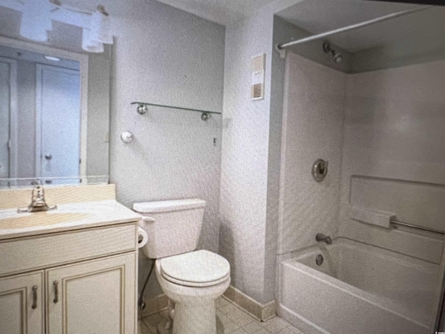 full bathroom with bathtub / shower combination, baseboards, vanity, and toilet