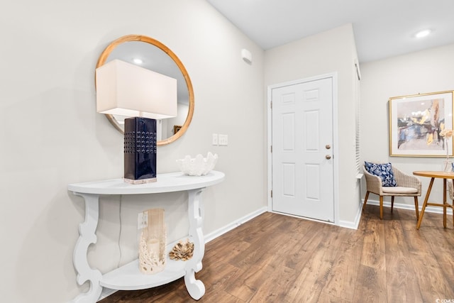 entryway with recessed lighting, baseboards, and wood finished floors