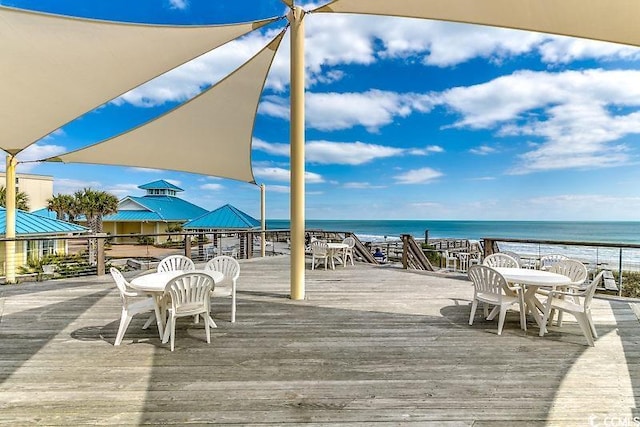 deck with a gazebo and a water view