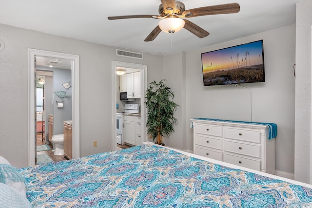 bedroom featuring ensuite bathroom, ceiling fan, and visible vents