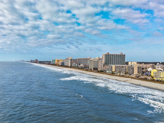 property view of water featuring a beach view and a city view