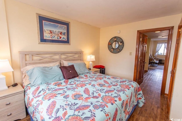 bedroom featuring wood finished floors