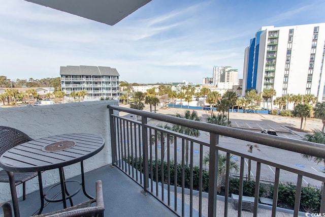 balcony featuring a city view