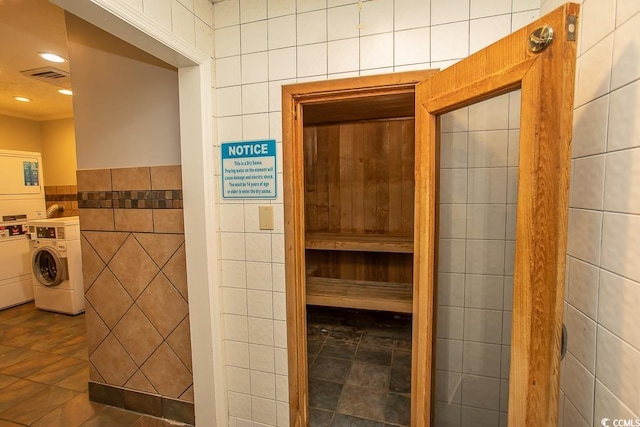 view of sauna with tile patterned floors and recessed lighting