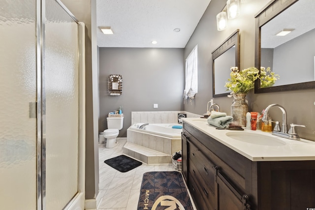 full bathroom featuring a stall shower, vanity, toilet, and a bath