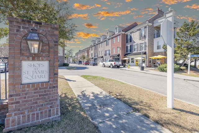 view of road featuring sidewalks and a residential view