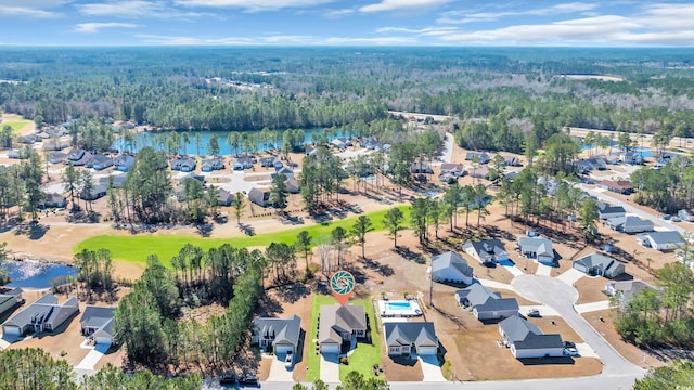 bird's eye view with a water view and a residential view