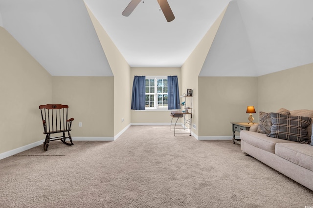 interior space featuring lofted ceiling, light colored carpet, ceiling fan, and baseboards