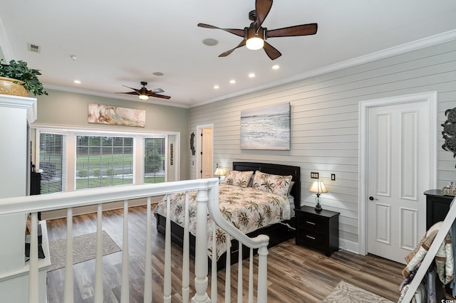 3100 Lahinch Dr, Myrtle Beach, SC 29579 - bedroom with ornamental molding, visible vents, wooden walls, and wood finished floors
