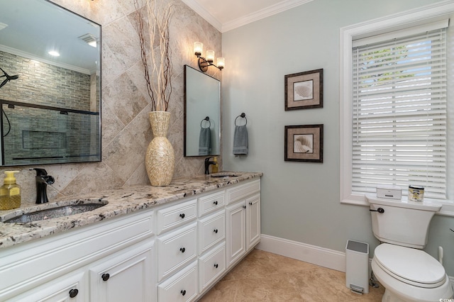 3100 Lahinch Dr, Myrtle Beach, SC 29579 - full bathroom featuring crown molding, a sink, baseboards, and double vanity
