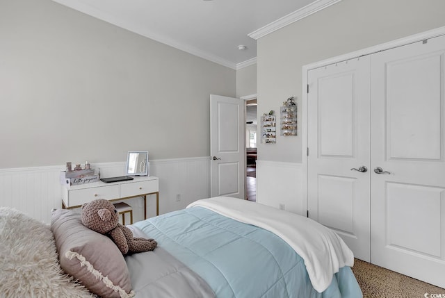 3600 White Wing Cir, Myrtle Beach, SC 29579 - bedroom featuring wainscoting, a closet, and crown molding