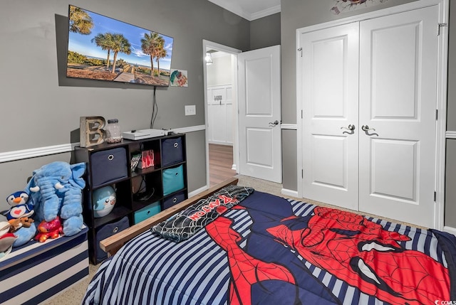3600 White Wing Cir, Myrtle Beach, SC 29579 - carpeted bedroom featuring a closet, crown molding, and baseboards