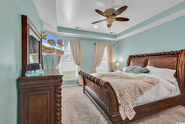 3600 White Wing Cir, Myrtle Beach, SC 29579 - carpeted bedroom featuring a raised ceiling, ceiling fan, and baseboards