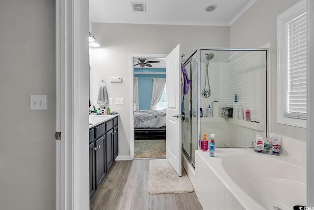 3600 White Wing Cir, Myrtle Beach, SC 29579 - full bath featuring a stall shower, ornamental molding, wood finished floors, vanity, and a bath