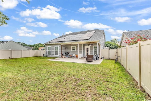 3600 White Wing Cir, Myrtle Beach, SC 29579 - rear view of property featuring a ceiling fan, solar panels, and a patio area