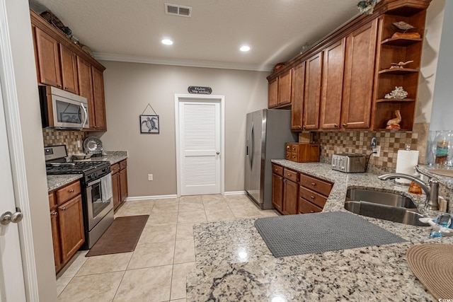 kitchen featuring visible vents, appliances with stainless steel finishes, open shelves, a sink, and light tile patterned flooring