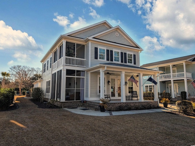 view of front facade with french doors and a ceiling fan