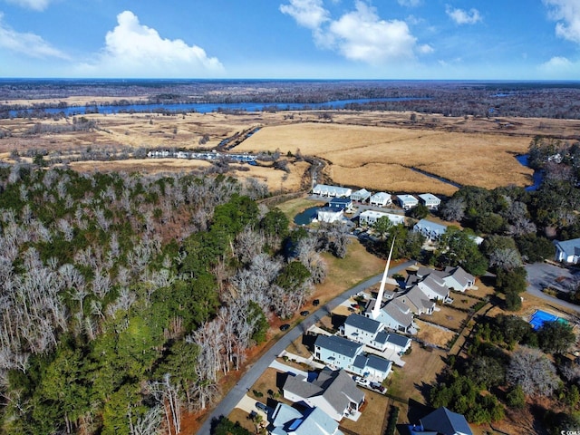 birds eye view of property with a residential view