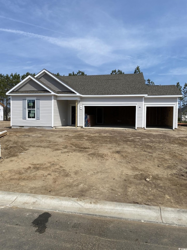 property under construction featuring a garage