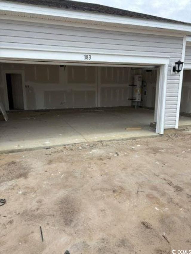 garage featuring water heater
