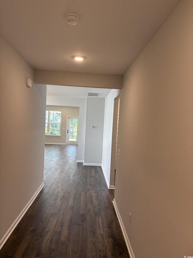 183 Glengrove Ln, Murrells Inlet, SC 29576 - corridor with dark wood-style floors and baseboards