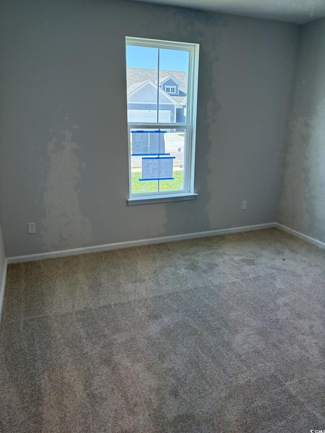 183 Glengrove Ln, Murrells Inlet, SC 29576 - carpeted empty room with baseboards