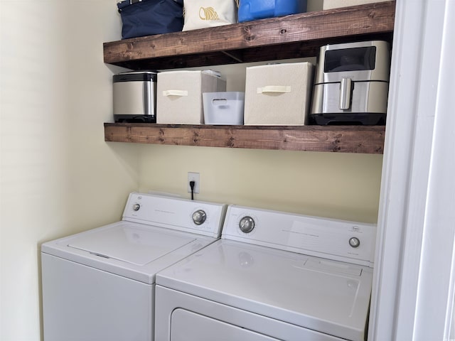 laundry room featuring laundry area and washing machine and clothes dryer