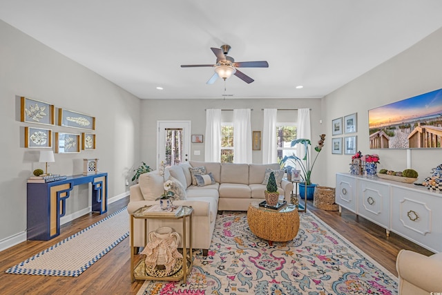 living room with a ceiling fan, baseboards, wood finished floors, and recessed lighting